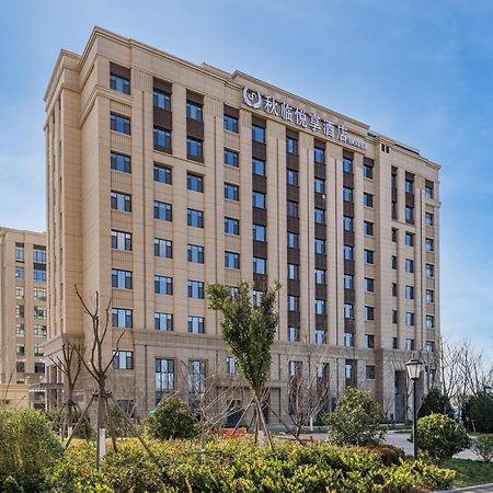 Joy Fall Hotel Цзяочжоу Екстер'єр фото