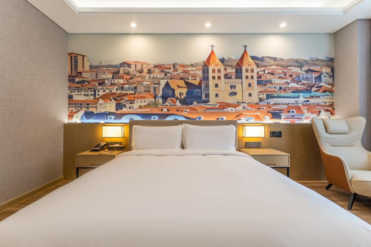 Joy Fall Hotel Цзяочжоу Екстер'єр фото
