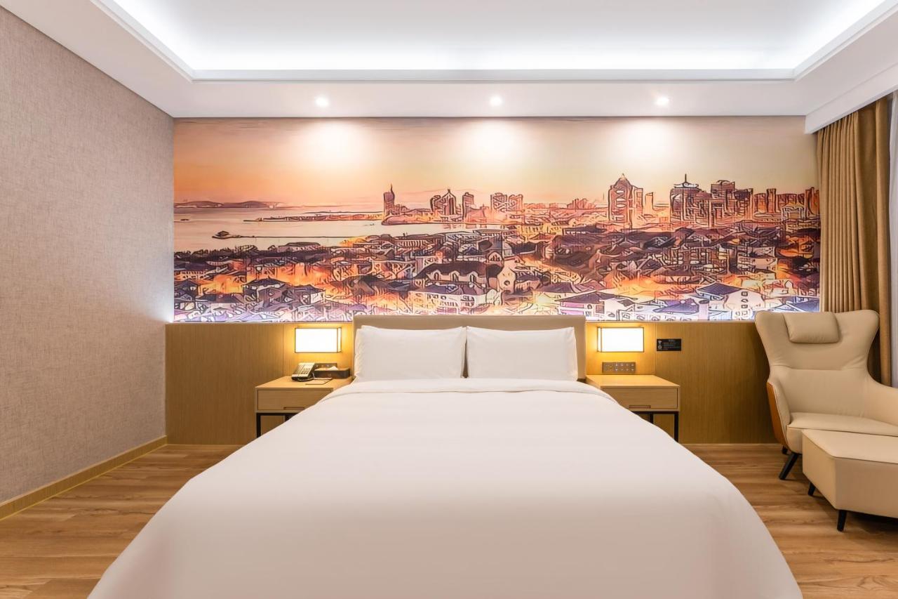Joy Fall Hotel Цзяочжоу Екстер'єр фото