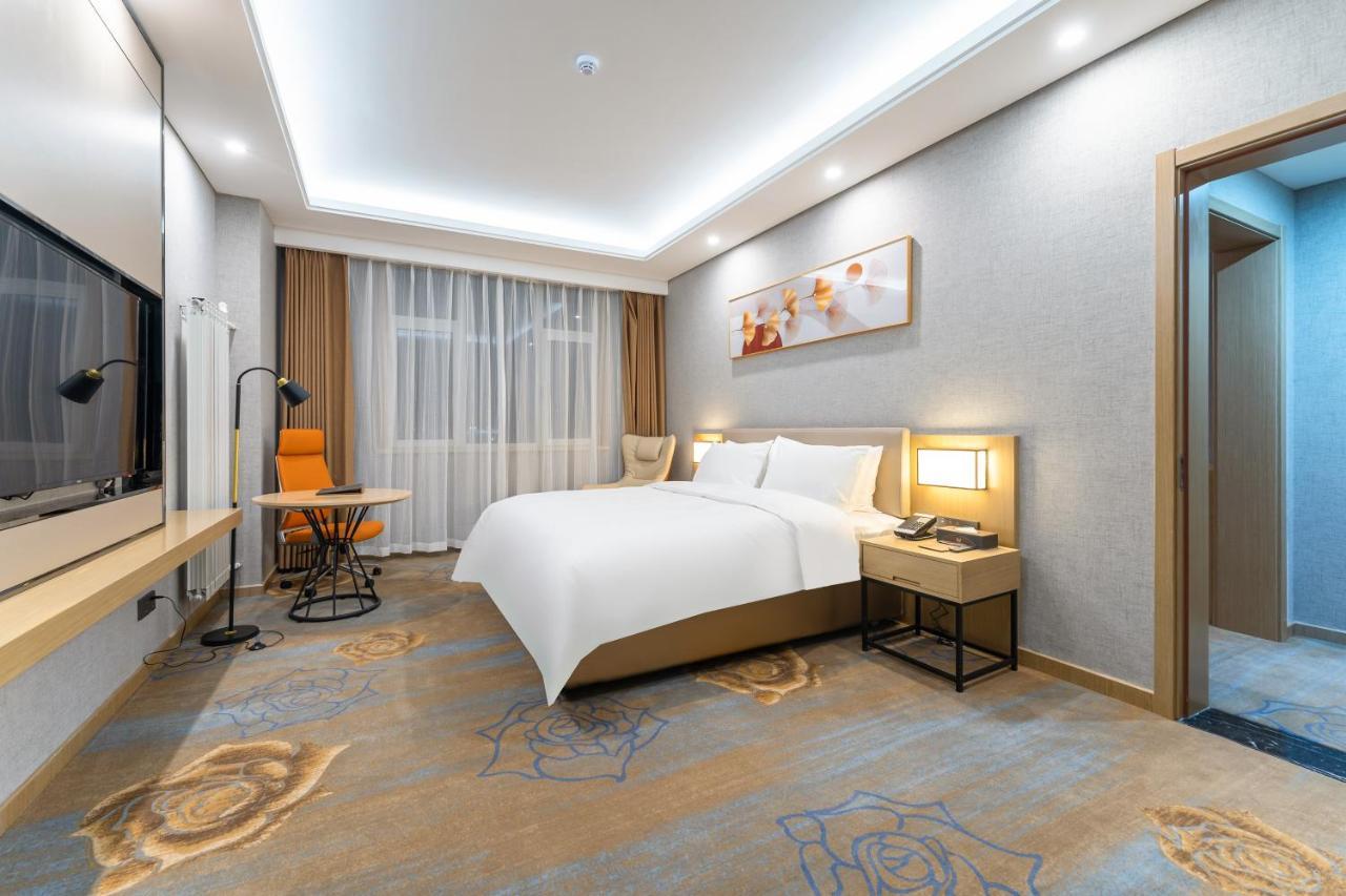 Joy Fall Hotel Цзяочжоу Екстер'єр фото